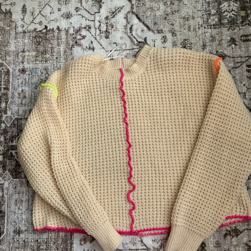 Stylish Beige Sweater with Colorful Accents
